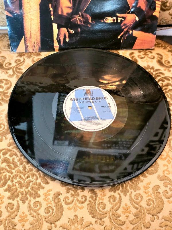 Whitehead Bros – Your Love Is A 187 Vinyl Record