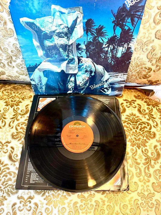 10cc – Bloody Tourists Vinyl Record - Yatva