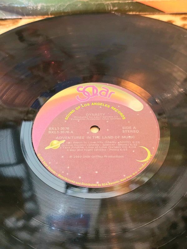 Dynasty – Adventures In The Land Of Music Vinyl Record