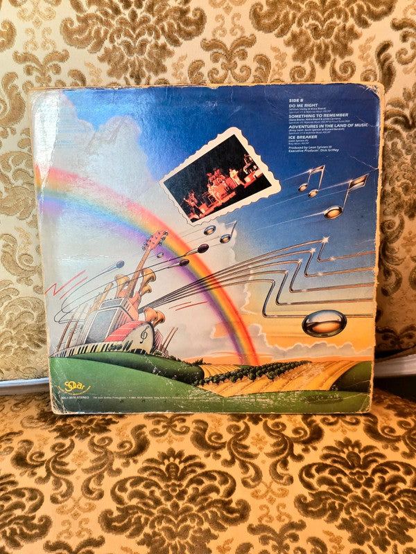 Dynasty – Adventures In The Land Of Music Vinyl Record