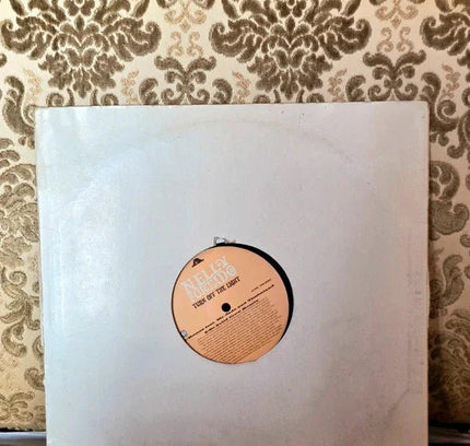 Nelly Furtado – Turn Off The Light Vinyl Record - Yatva