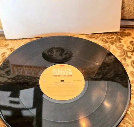 Nelly Furtado – Turn Off The Light Vinyl Record - Yatva