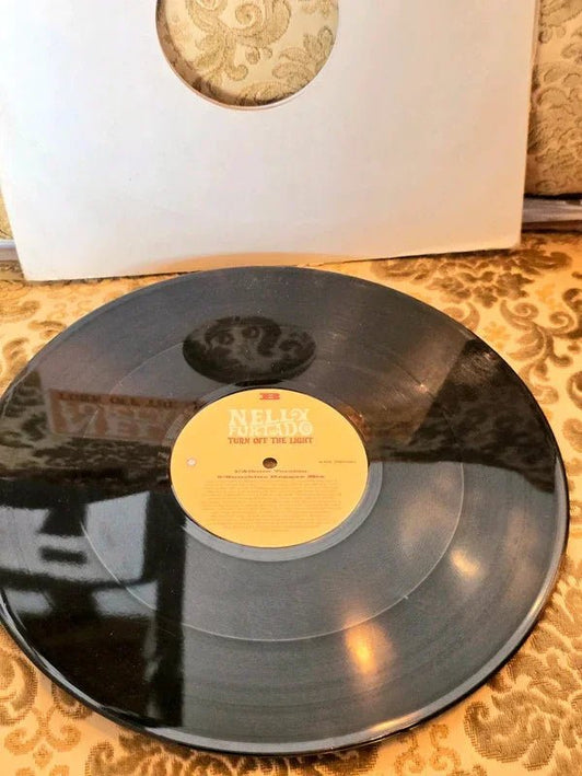 Nelly Furtado – Turn Off The Light Vinyl Record - Yatva