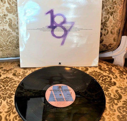 Whitehead Bros – Your Love Is A 187 Vinyl Record - Yatva